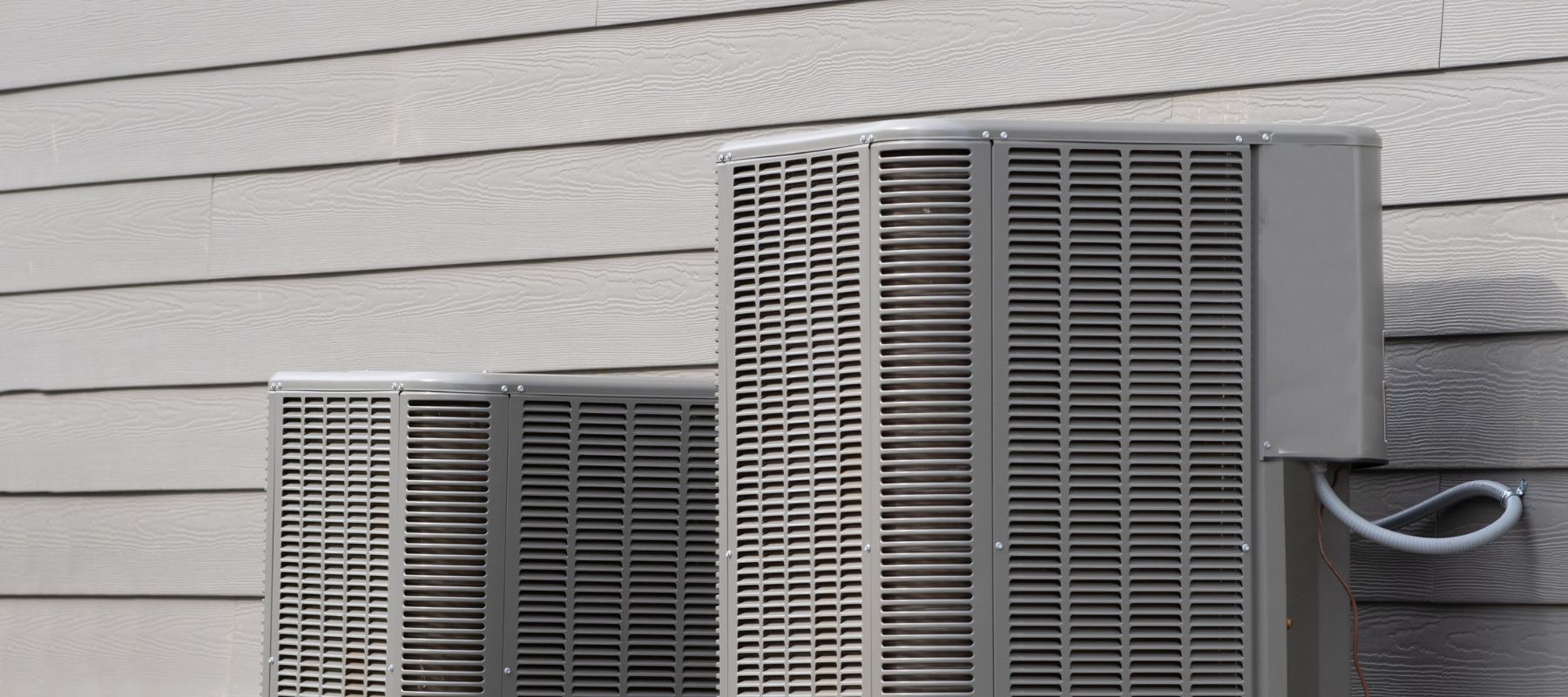 outdoor hvac units positioned outside of home