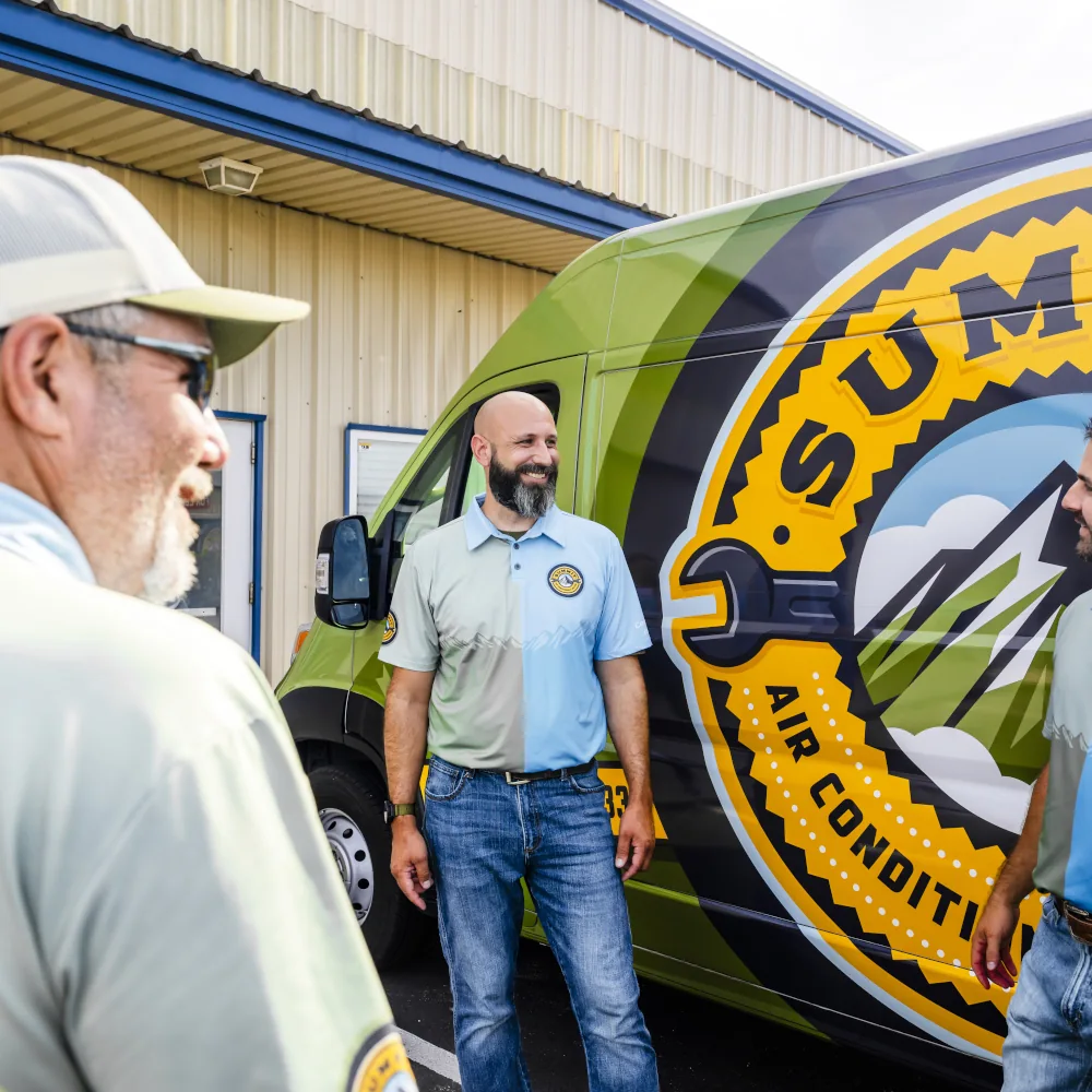 Summit AC team members talking