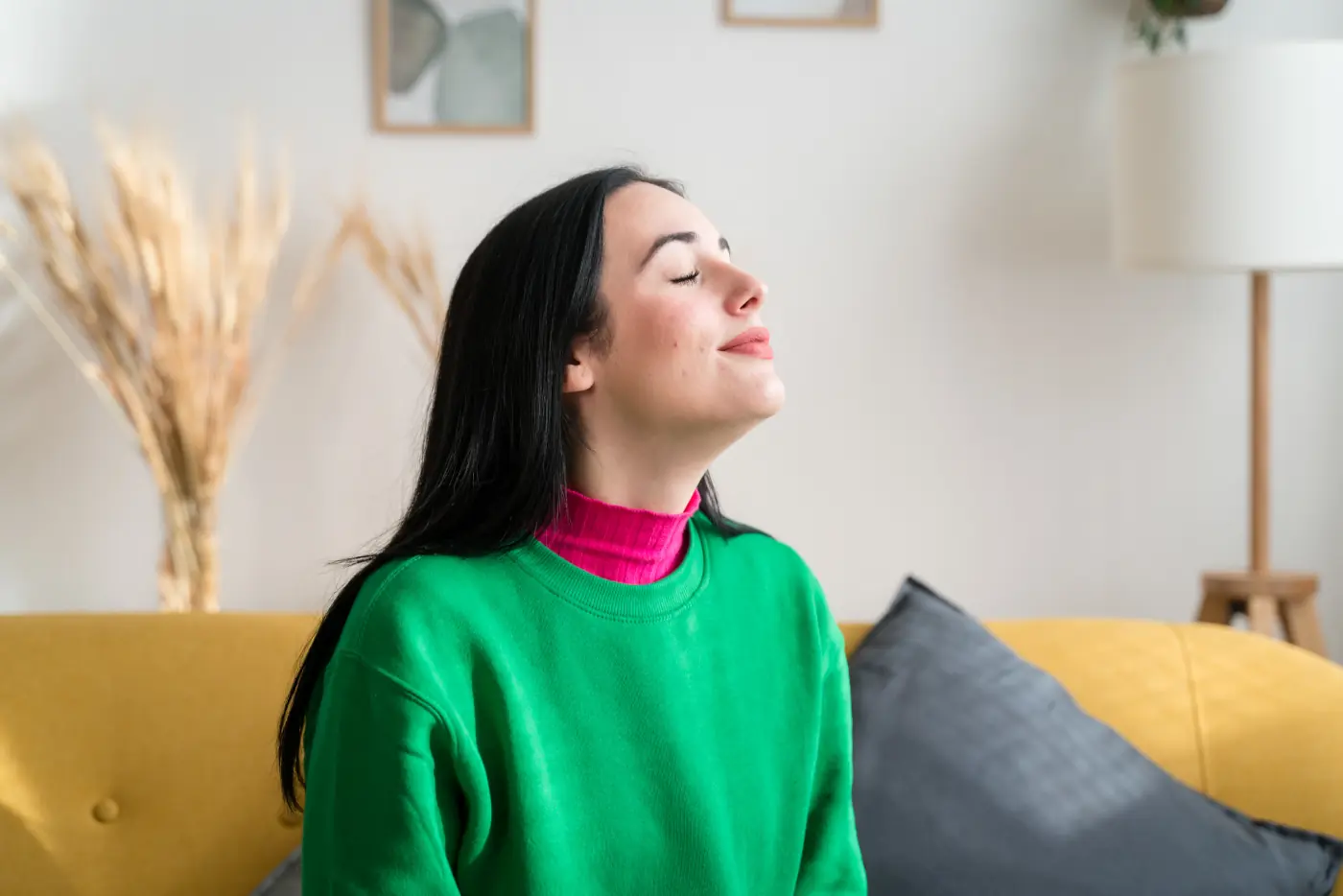 Woman breathing clean air at home